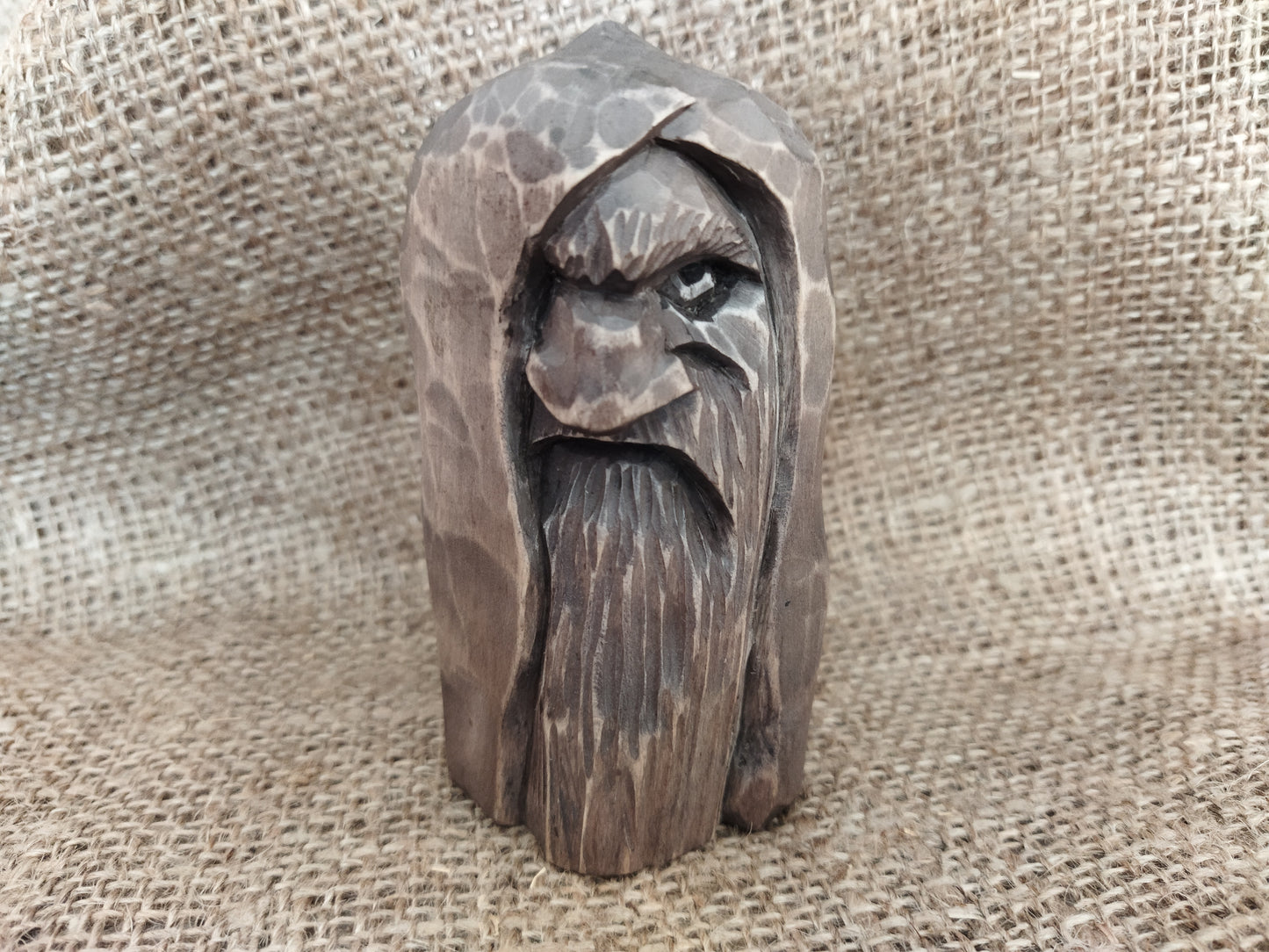 Odin statue. Wood carving. Scandinavian mythology.