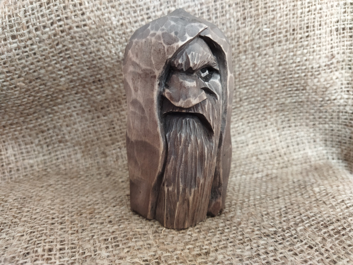 Odin statue. Wood carving. Scandinavian mythology.