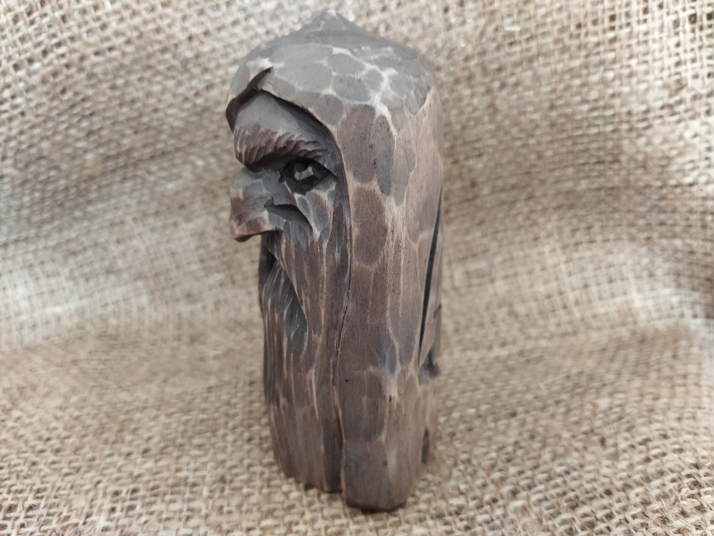 Odin statue. Wood carving. Scandinavian mythology.