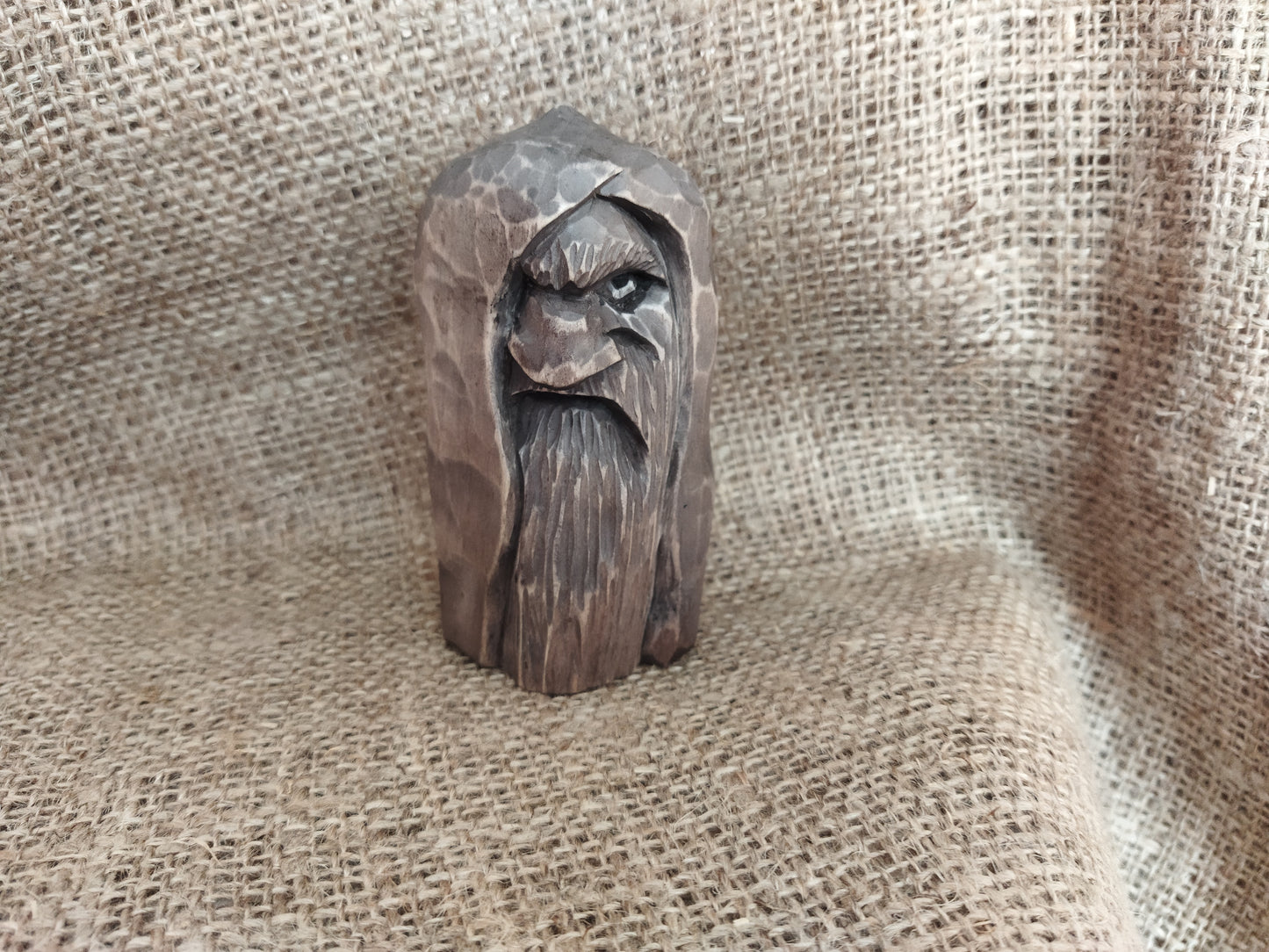 Odin statue. Wood carving. Scandinavian mythology.