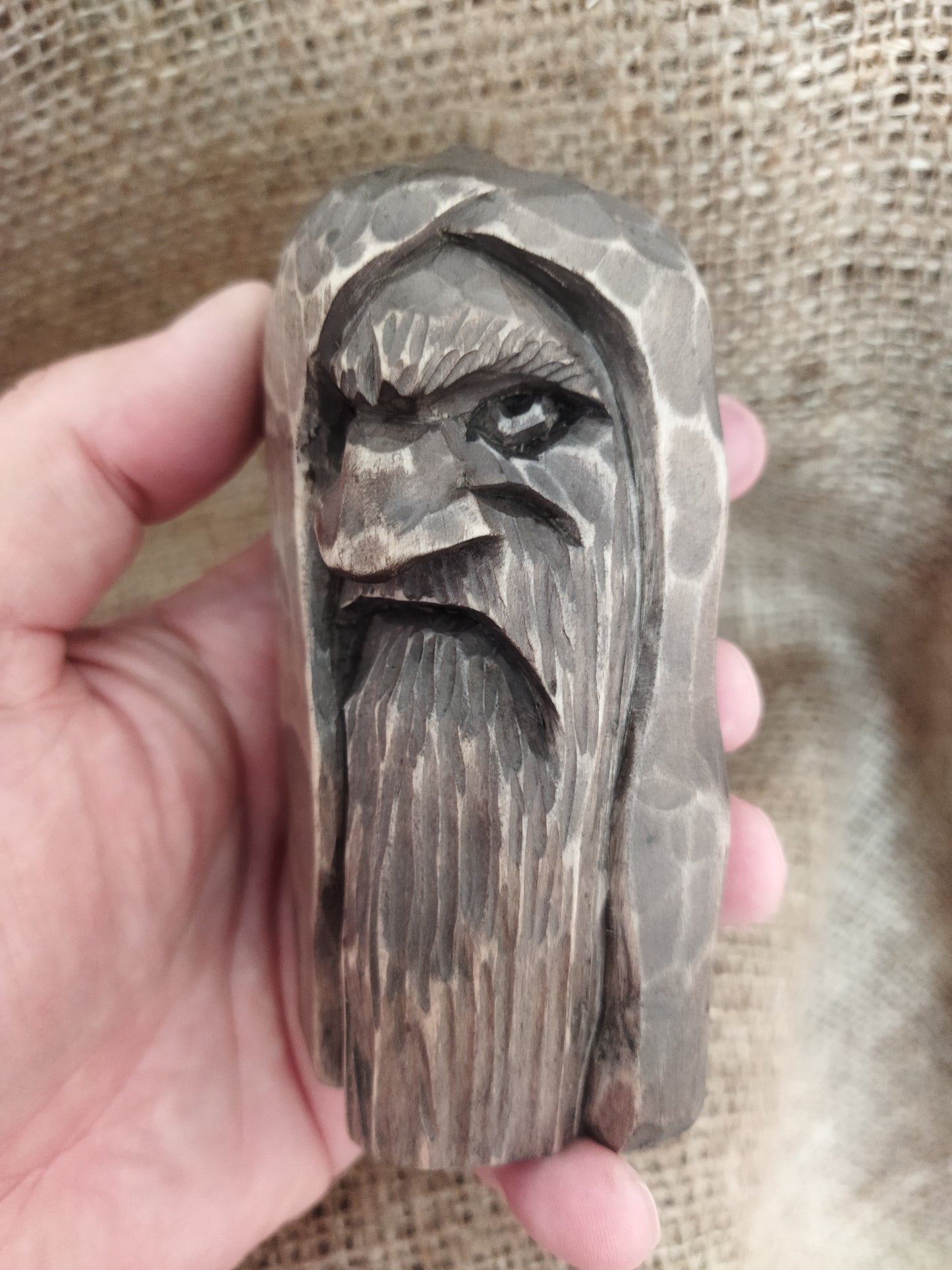 Odin statue. Wood carving. Scandinavian mythology.