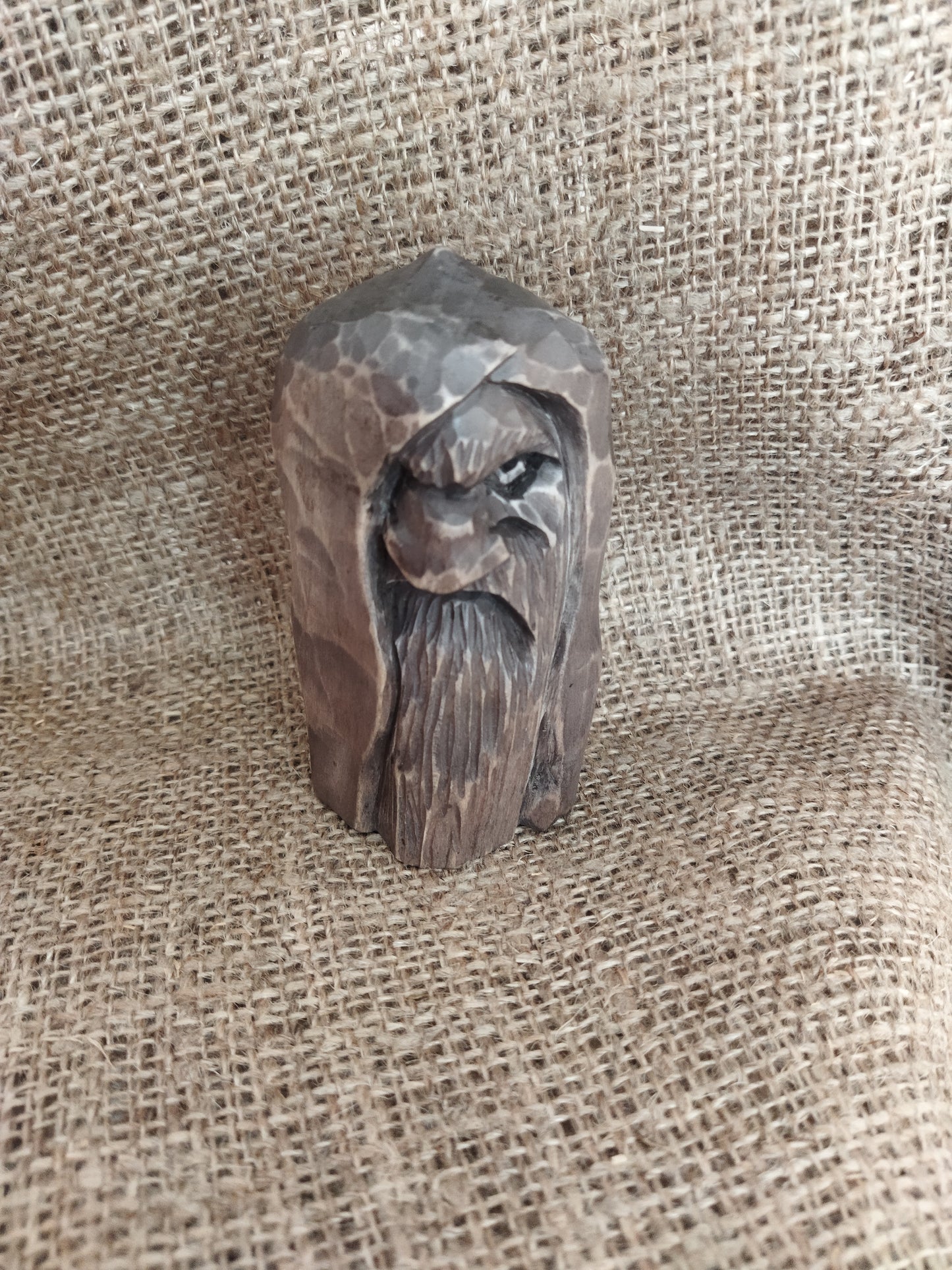 Odin statue. Wood carving. Scandinavian mythology.