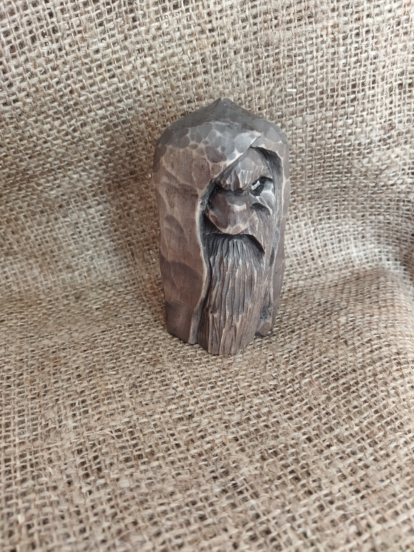 Odin statue. Wood carving. Scandinavian mythology.