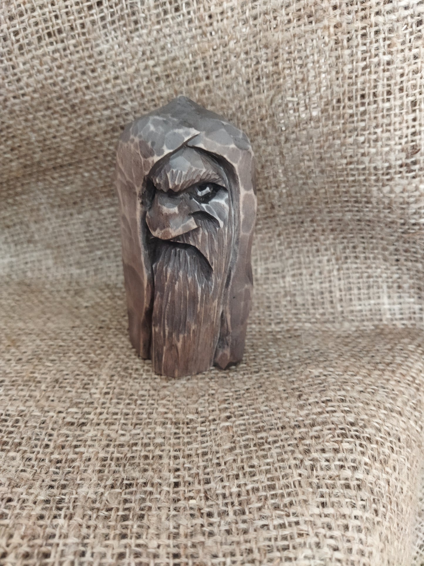 Odin statue. Wood carving. Scandinavian mythology.