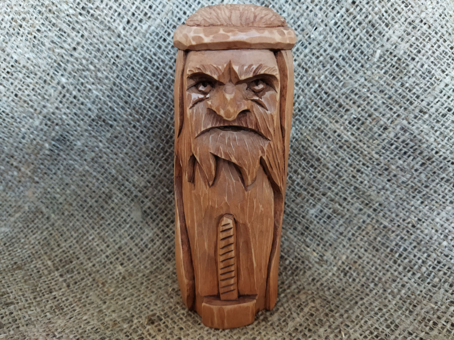 Hammer of Creation. Svarog statuette. Handmade wooden figurine of the god Svarog. Wood carving.