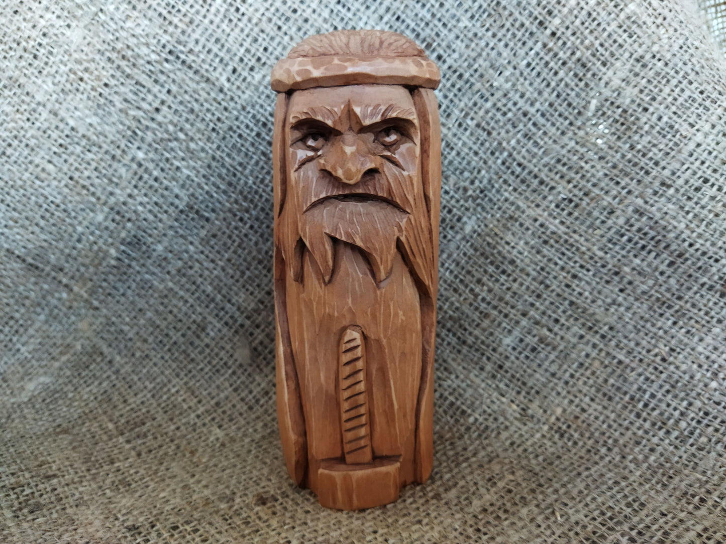 Hammer of Creation. Svarog statuette. Handmade wooden figurine of the god Svarog. Wood carving.