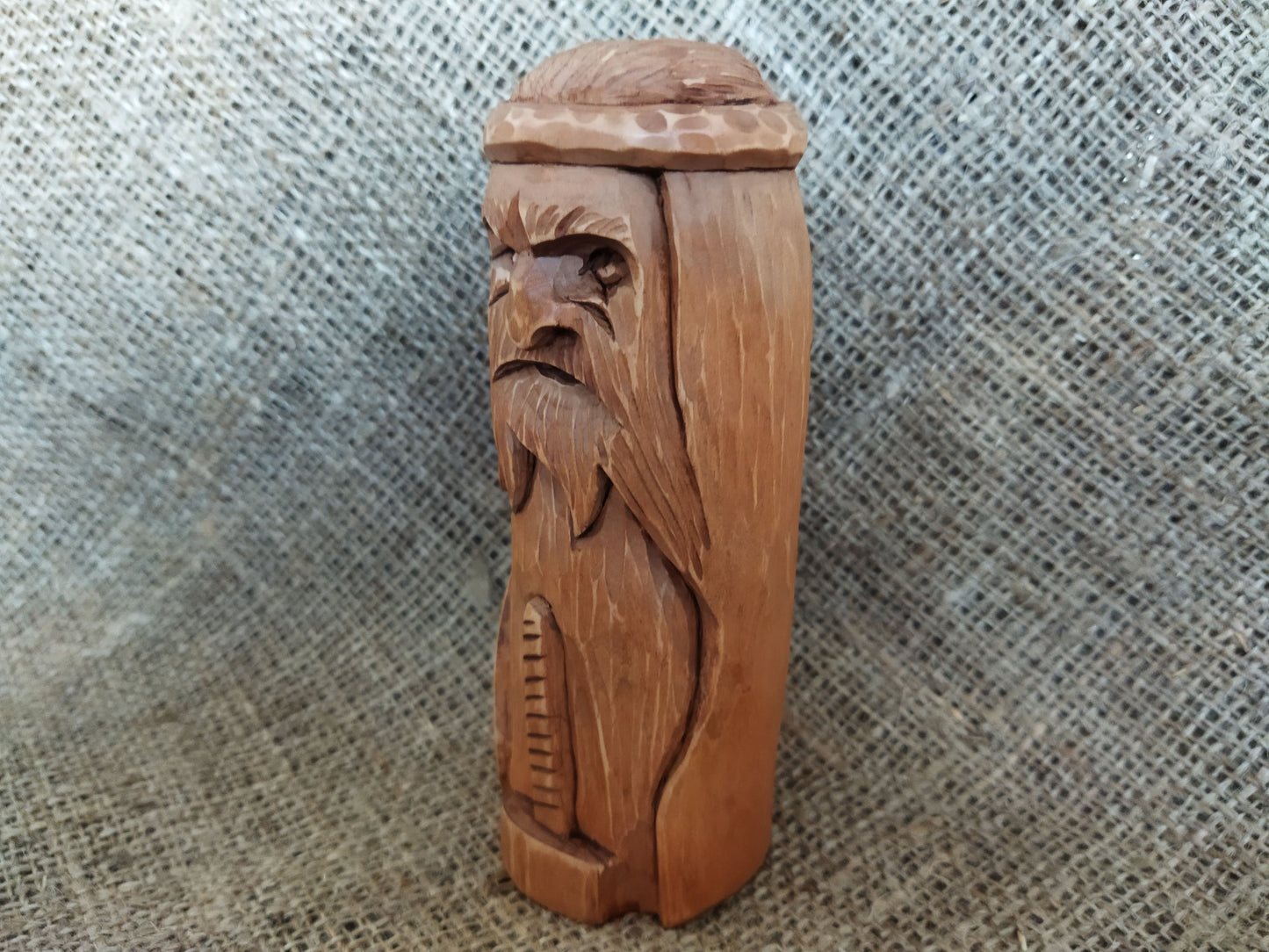 Hammer of Creation. Svarog statuette. Handmade wooden figurine of the god Svarog. Wood carving.