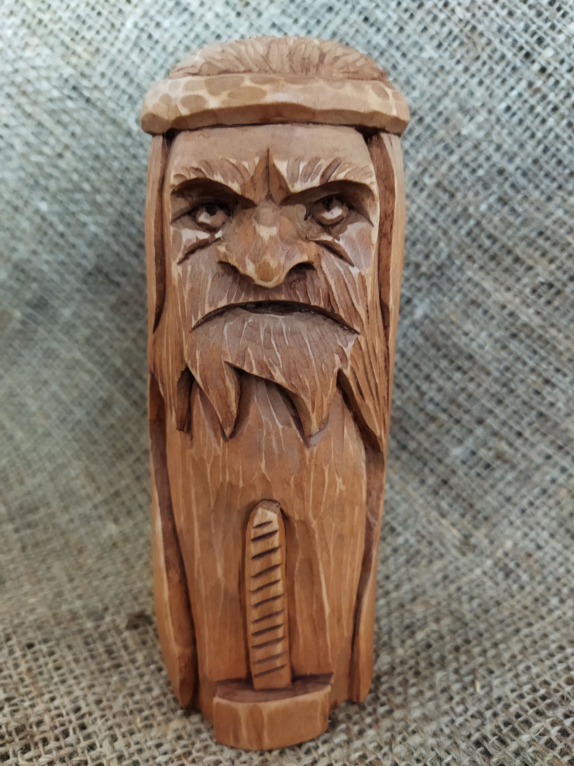 Hammer of Creation. Svarog statuette. Handmade wooden figurine of the god Svarog. Wood carving.