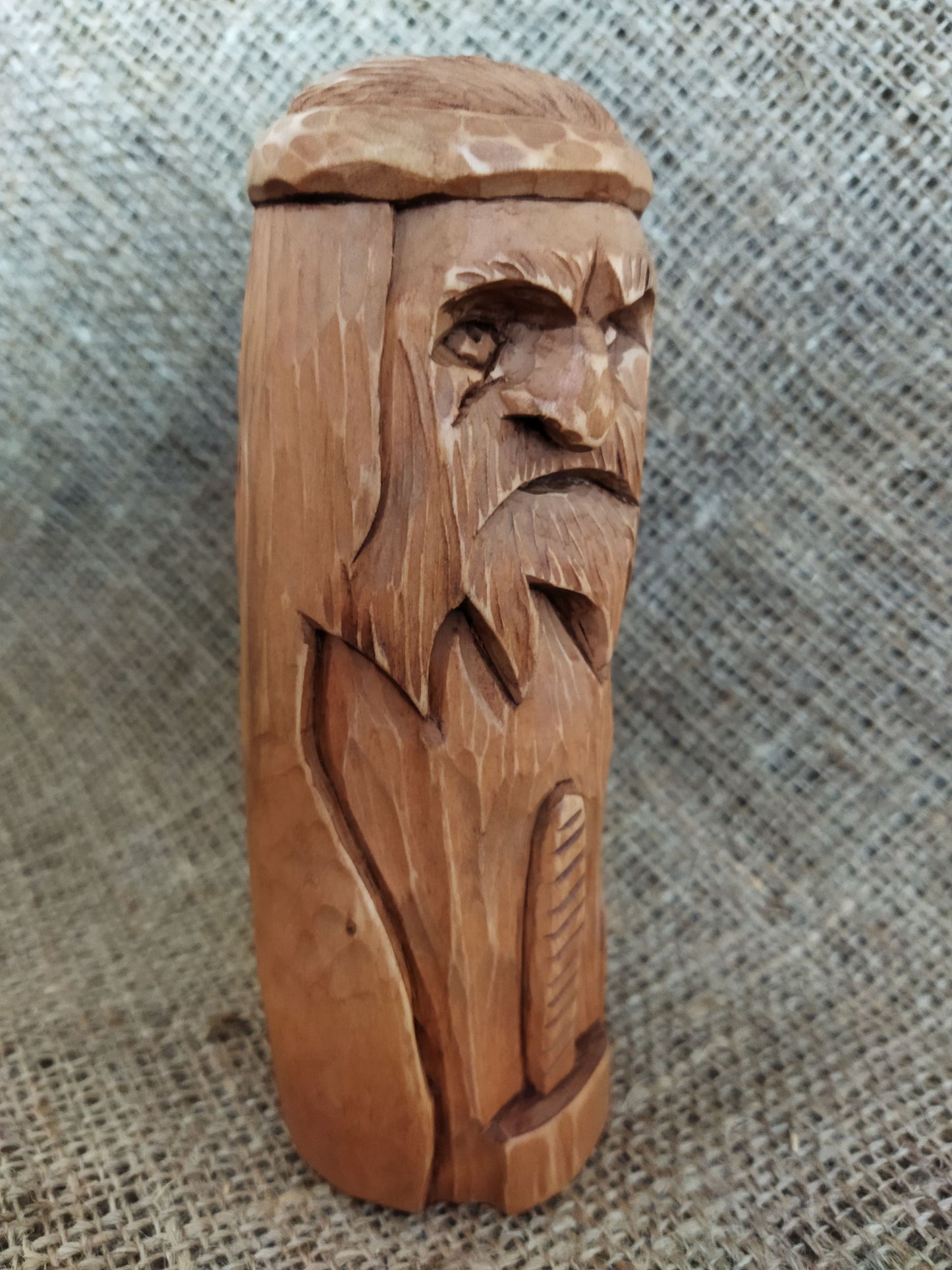 Hammer of Creation. Svarog statuette. Handmade wooden figurine of the god Svarog. Wood carving.