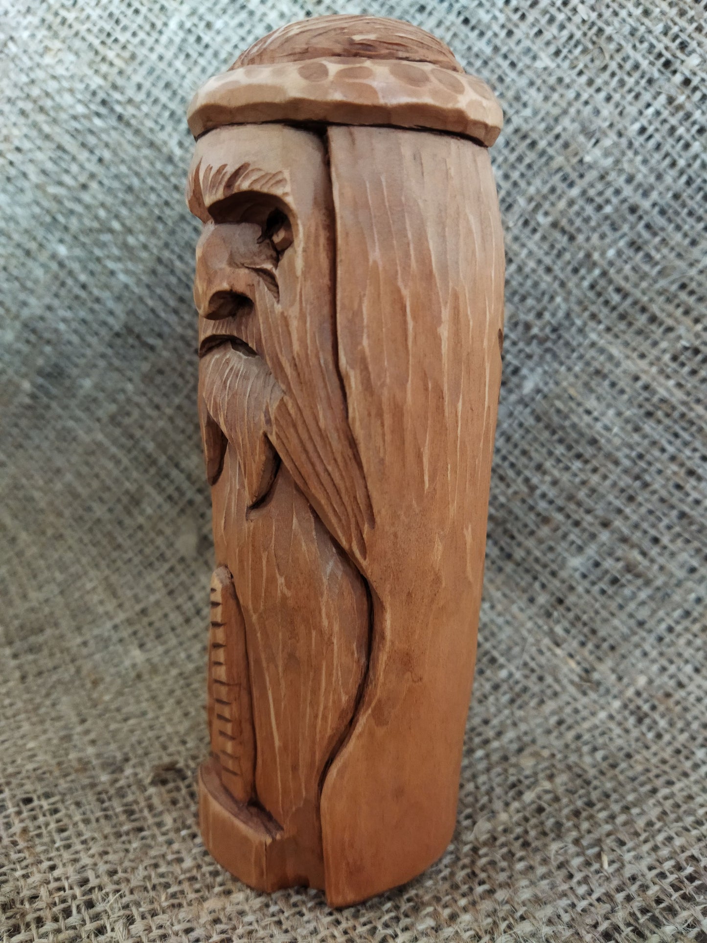 Hammer of Creation. Svarog statuette. Handmade wooden figurine of the god Svarog. Wood carving.