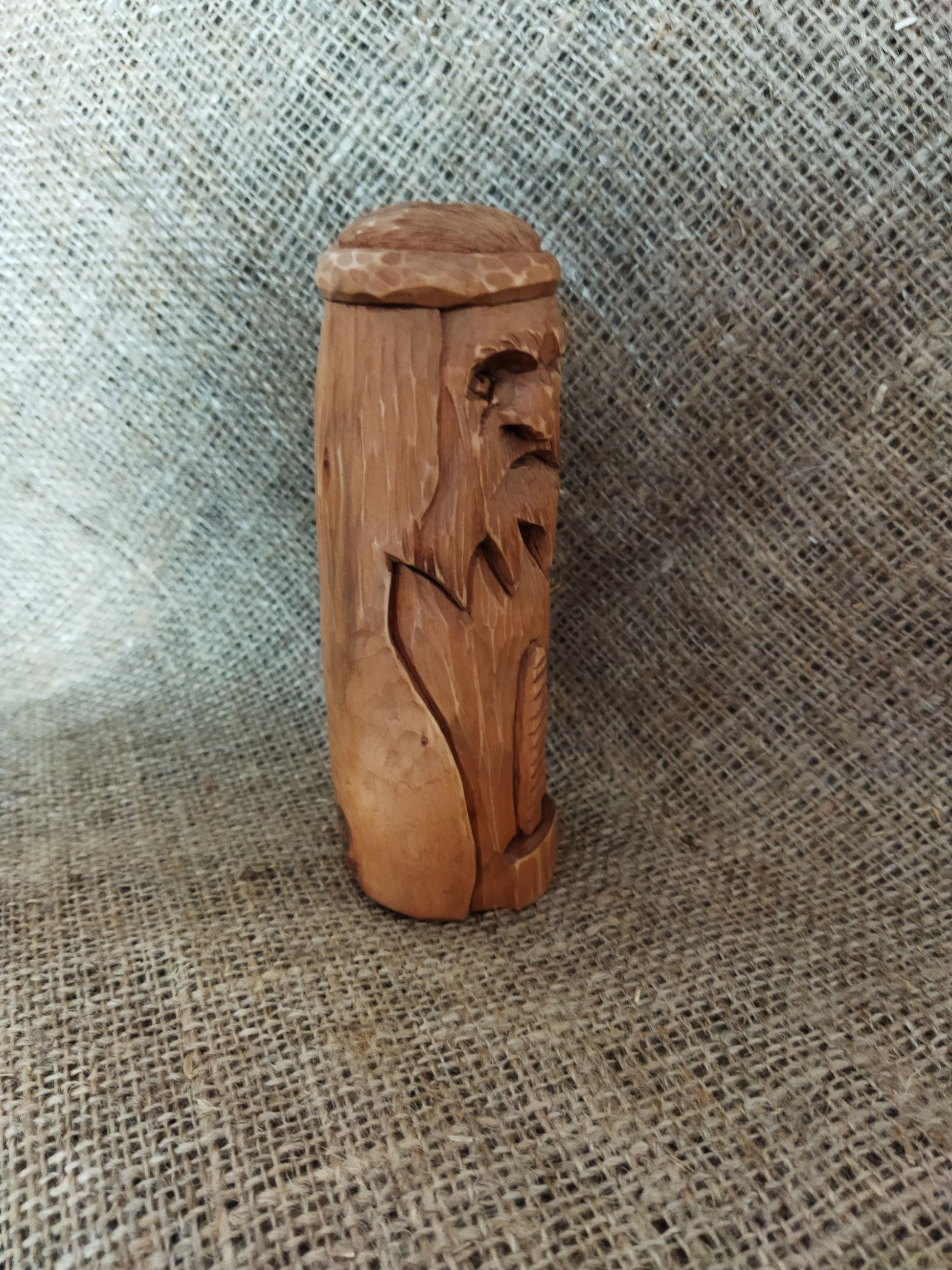 Hammer of Creation. Svarog statuette. Handmade wooden figurine of the god Svarog. Wood carving.