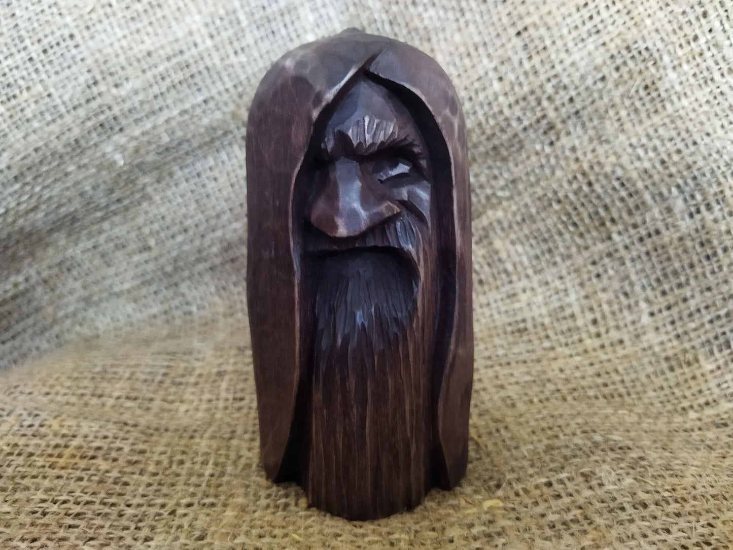 Odin statue. Handmade wooden statue of the god Odin 