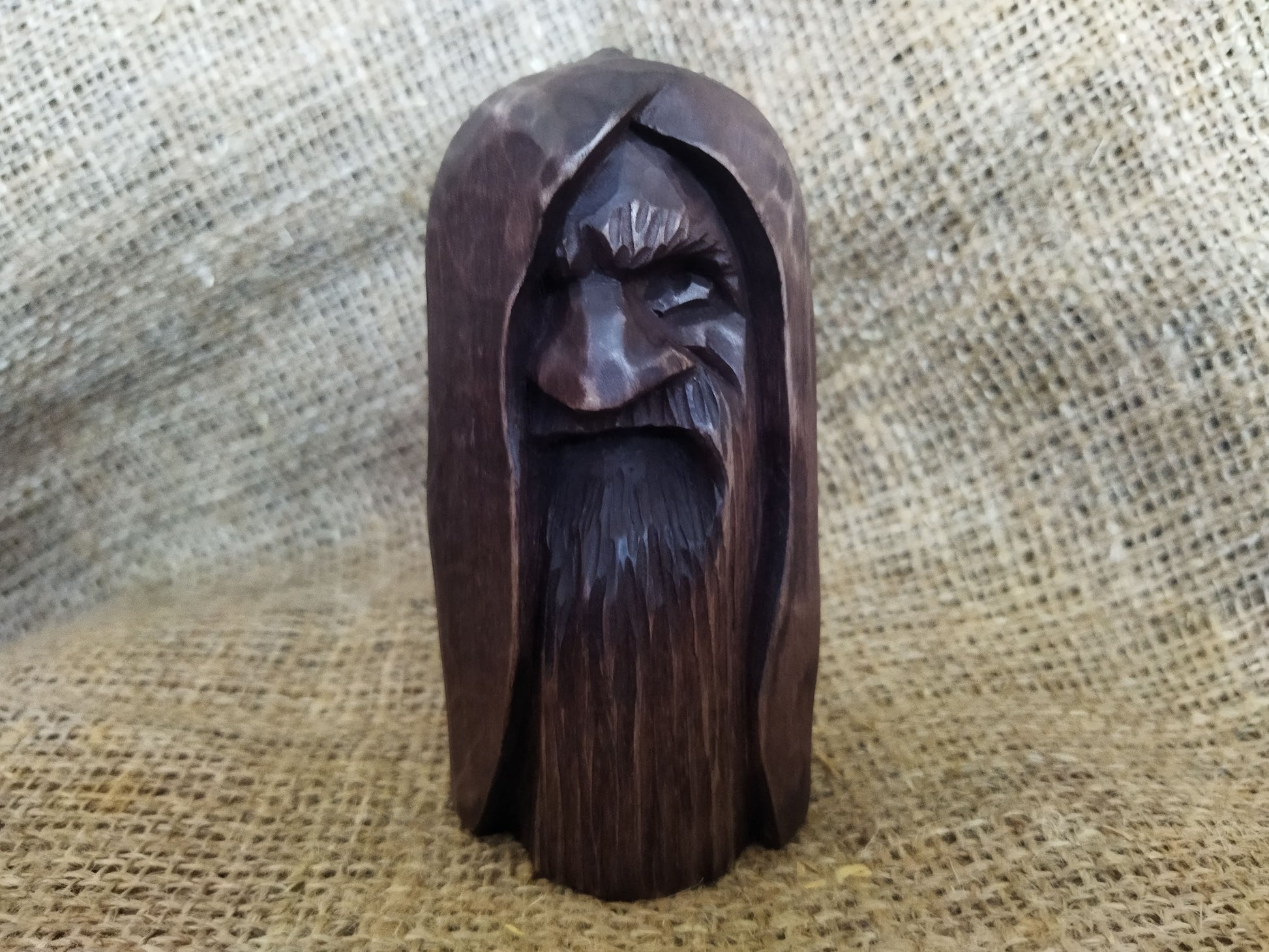 Odin statue. Handmade wooden statue of the god Odin 