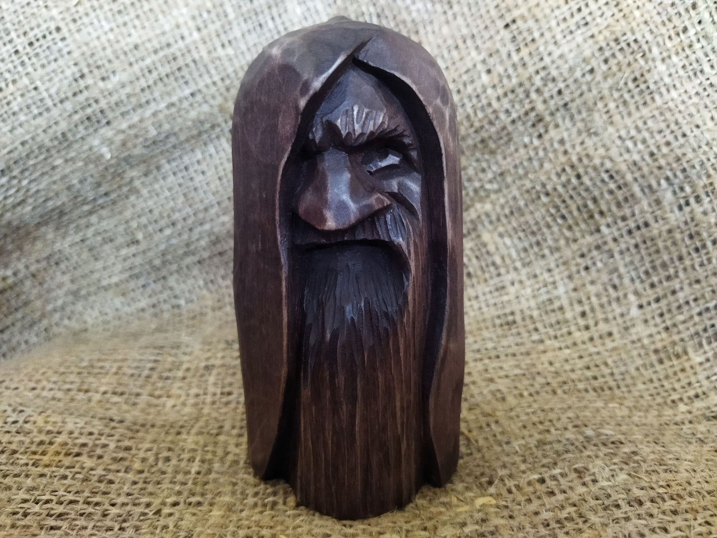 Odin statue. Handmade wooden statue of the god Odin 