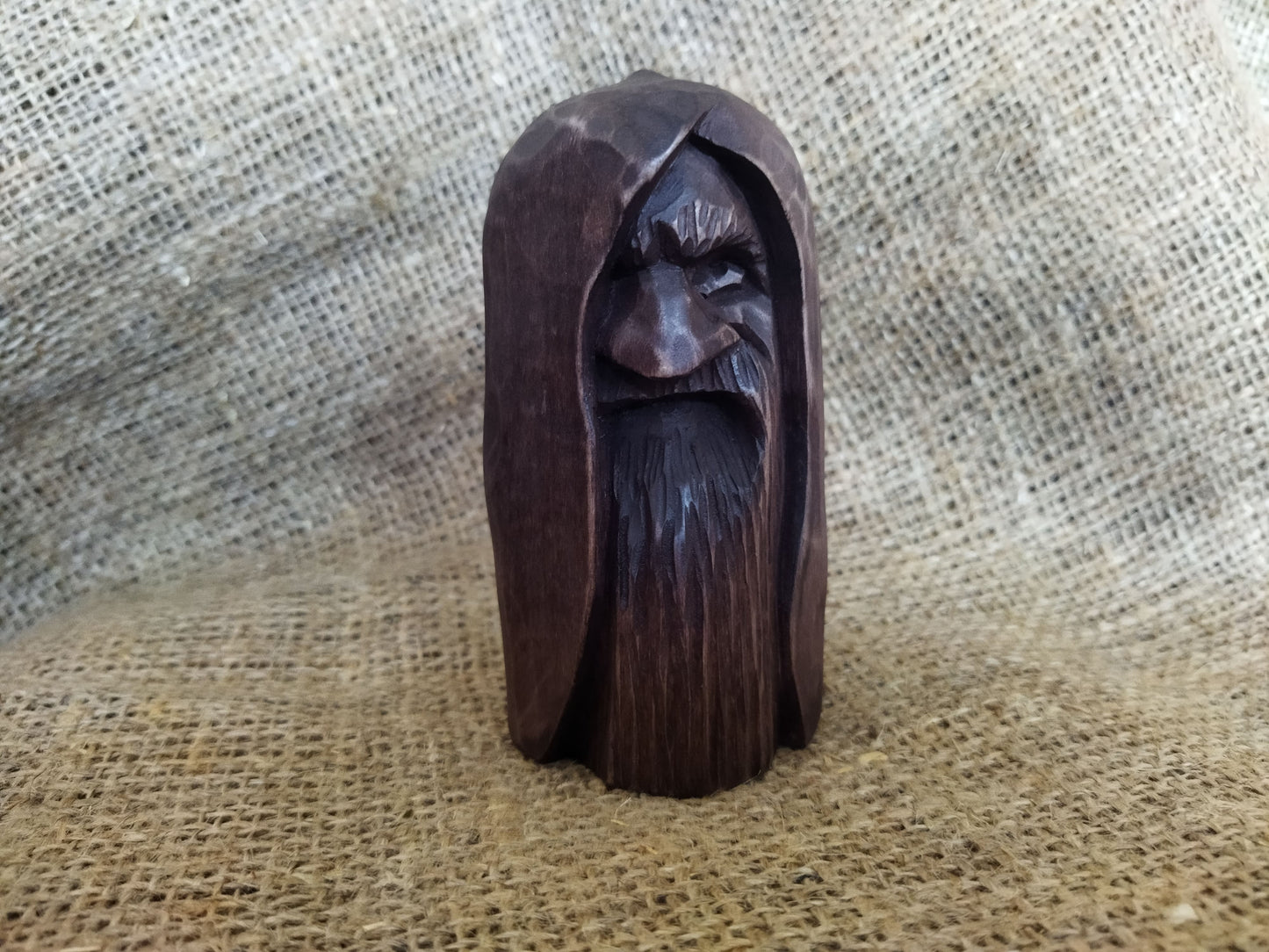 Odin statue. Handmade wooden statue of the god Odin 