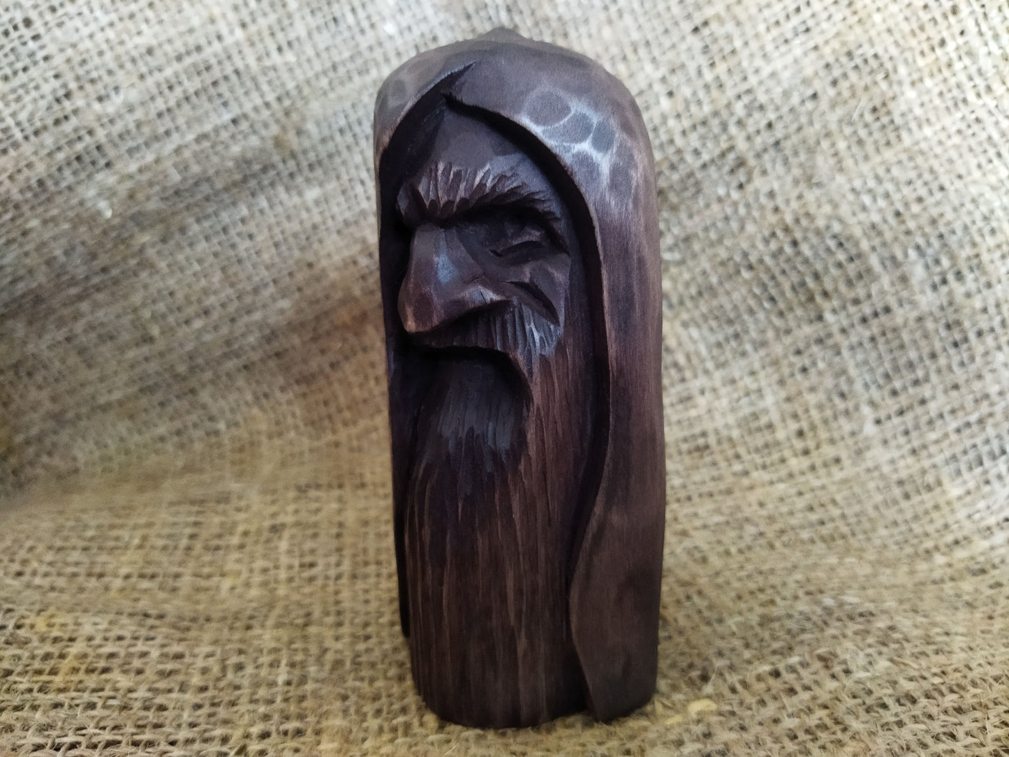 Odin statue. Handmade wooden statue of the god Odin 