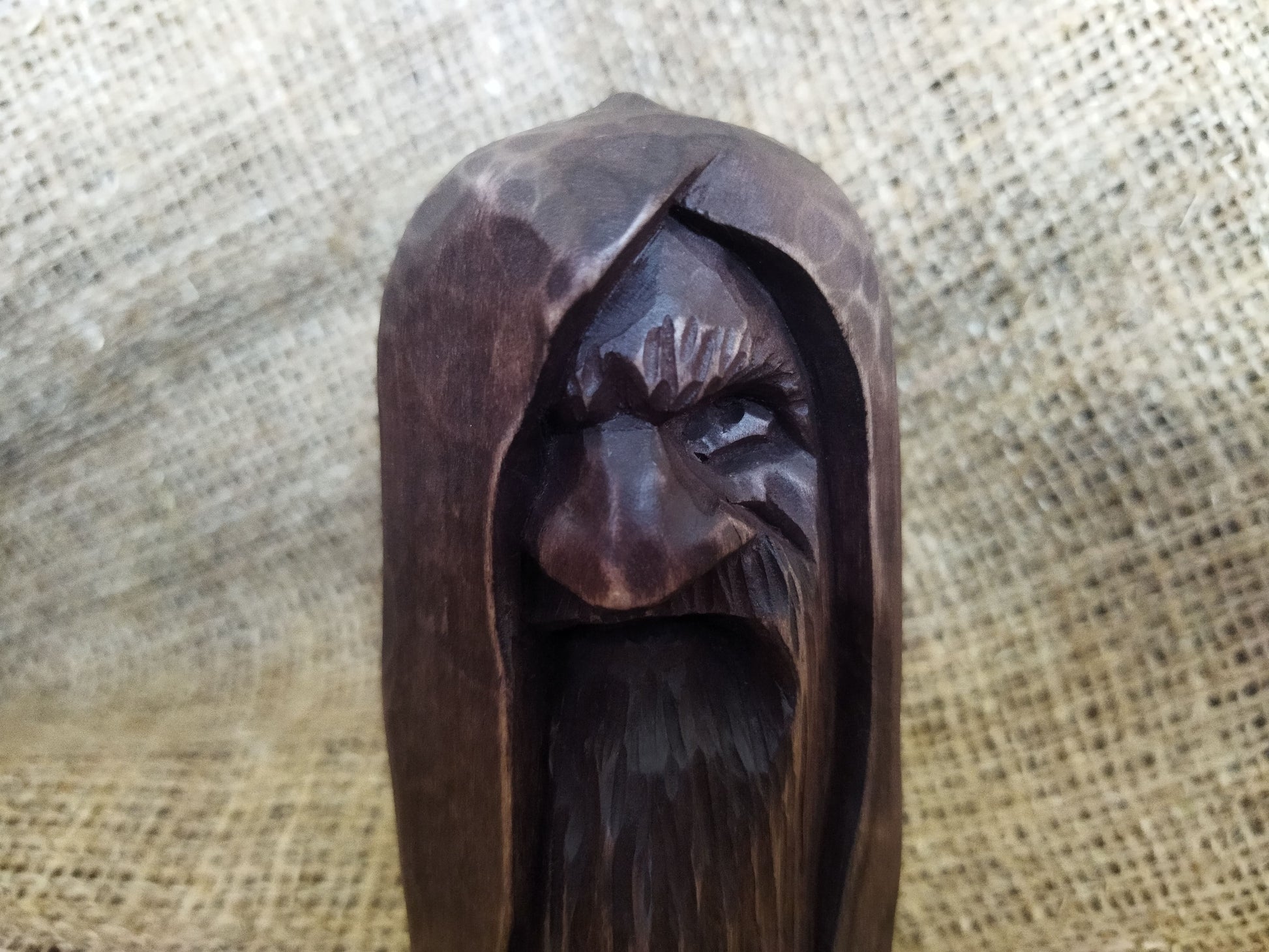 Odin statue. Handmade wooden statue of the god Odin 