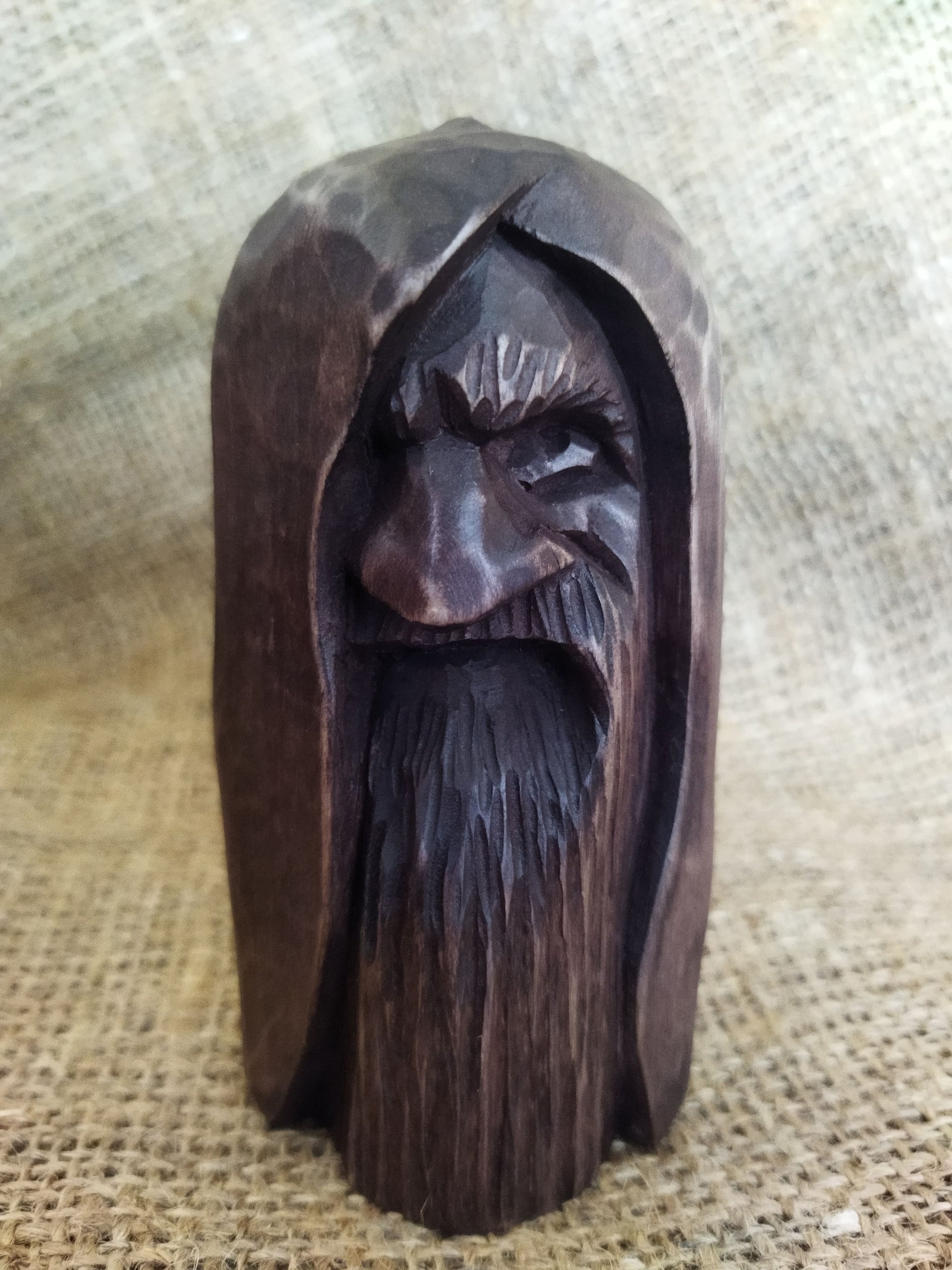 Odin statue. Handmade wooden statue of the god Odin 