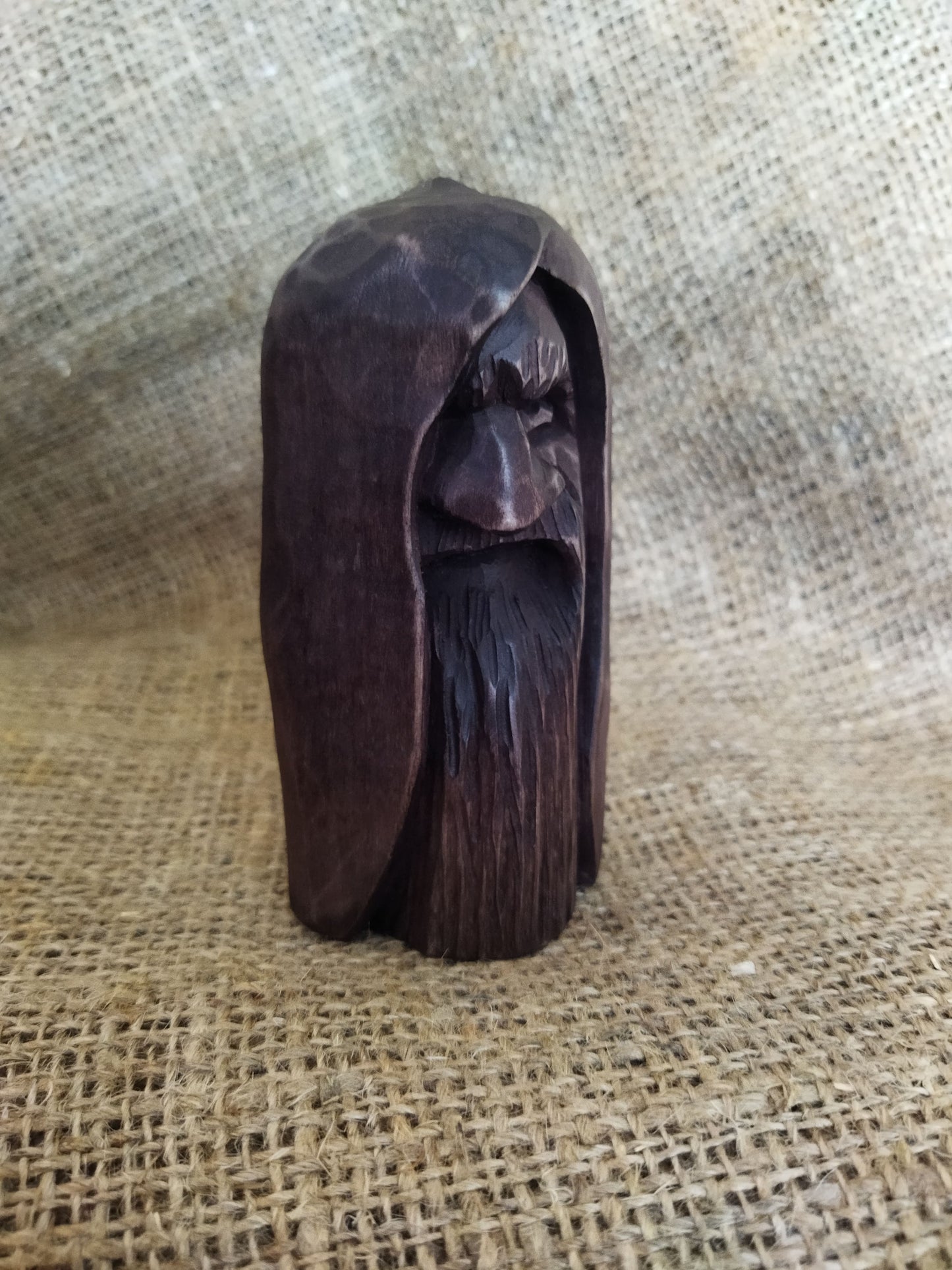 Odin statue. Handmade wooden statue of the god Odin 