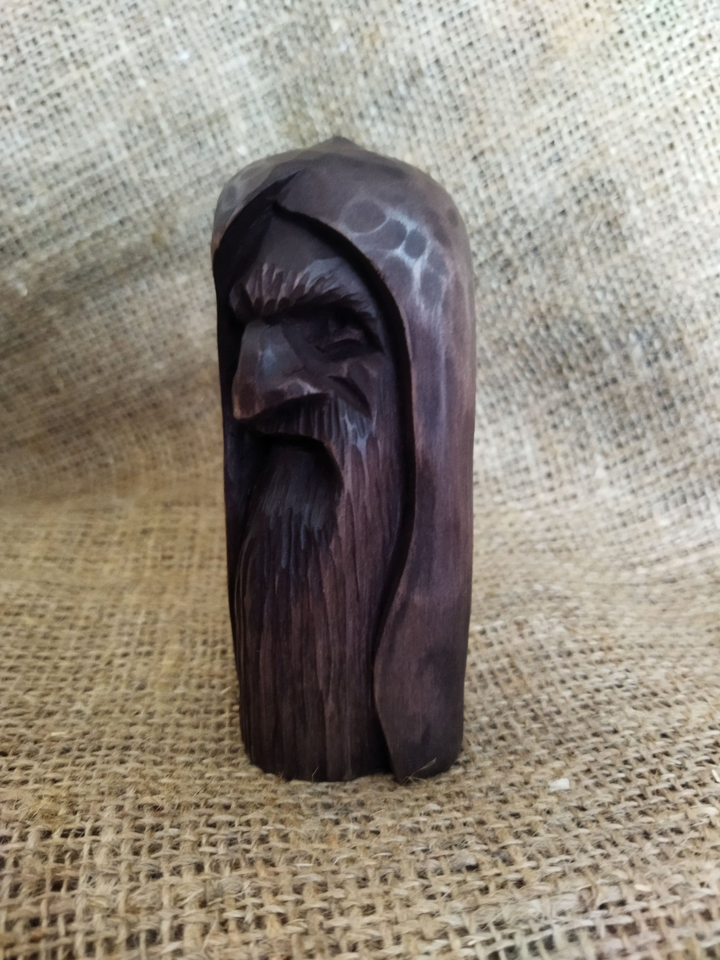 Odin statue. Handmade wooden statue of the god Odin 