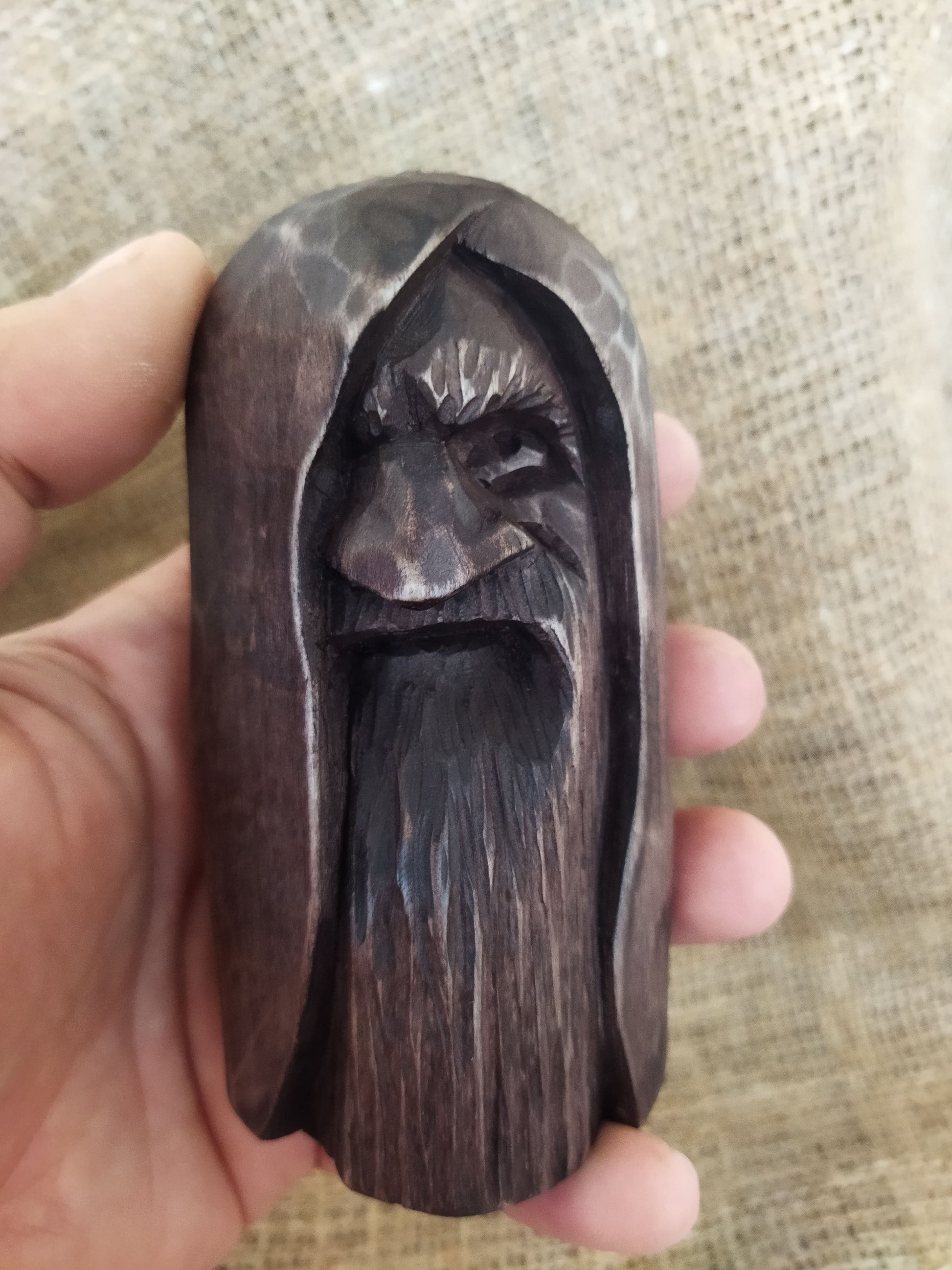 Odin statue. Handmade wooden statue of the god Odin 