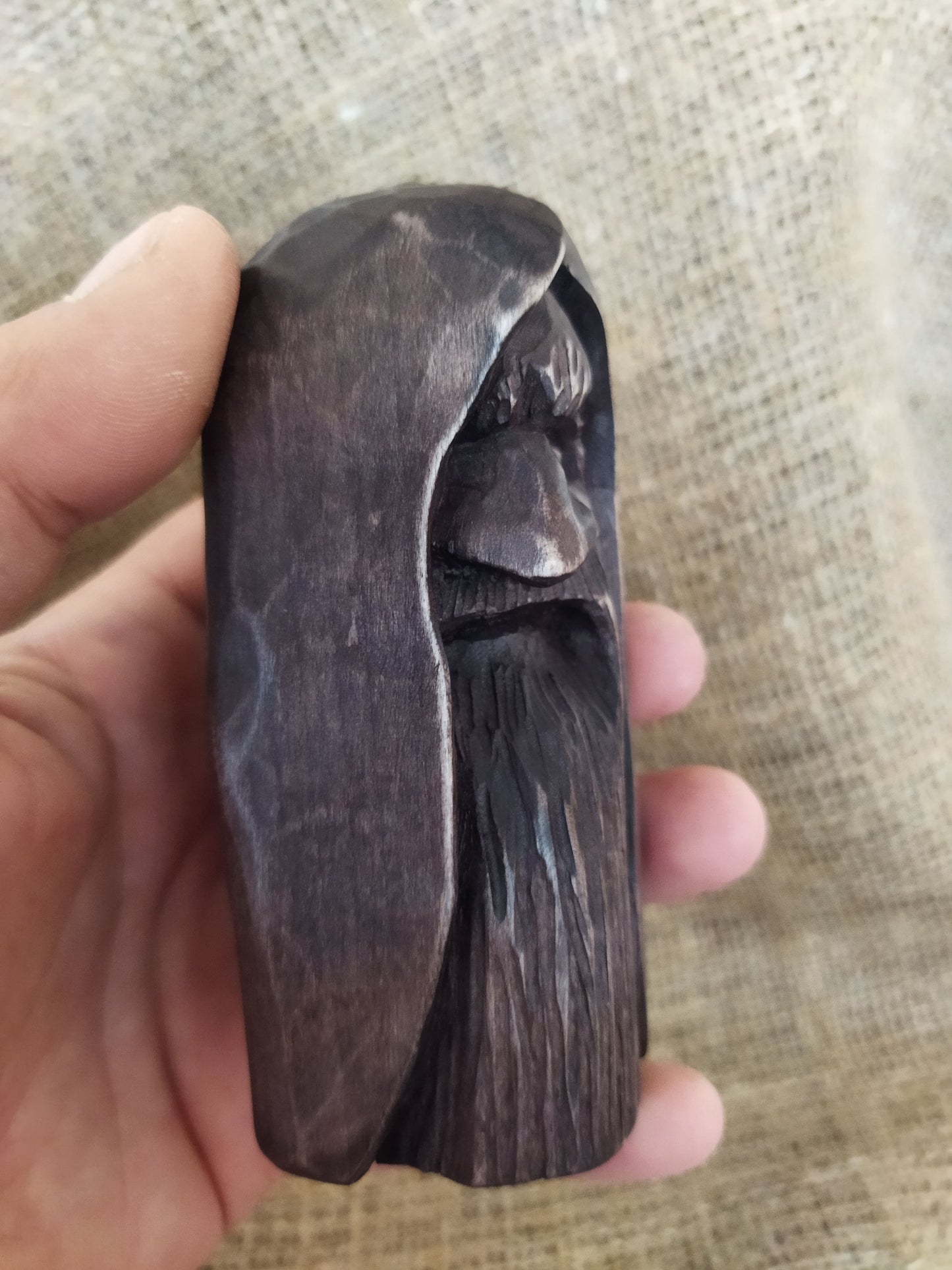 Odin statue. Handmade wooden statue of the god Odin 