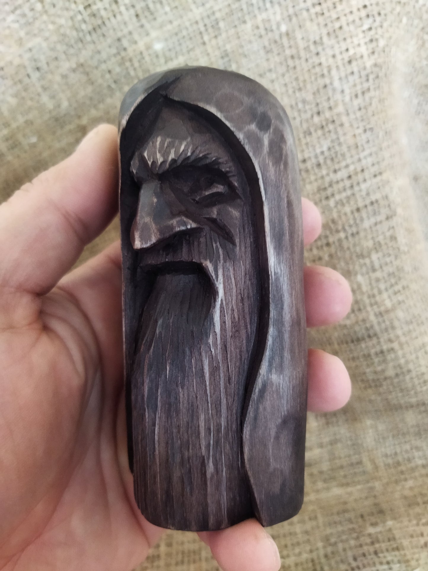 Odin statue. Handmade wooden statue of the god Odin 