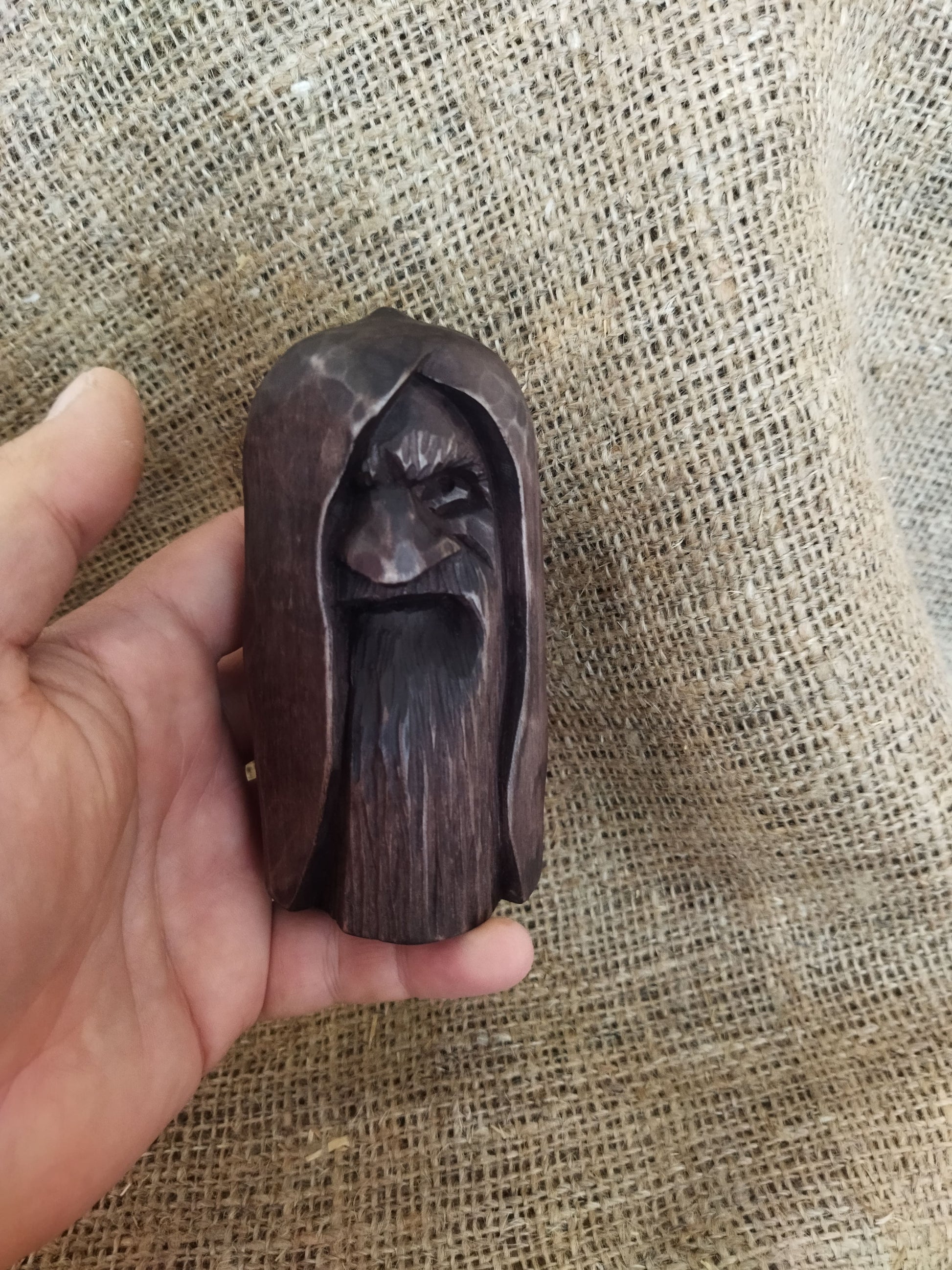 Odin statue. Handmade wooden statue of the god Odin 