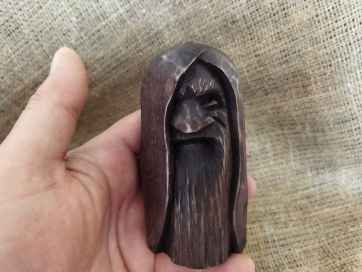 Odin statue. Handmade wooden statue of the god Odin 