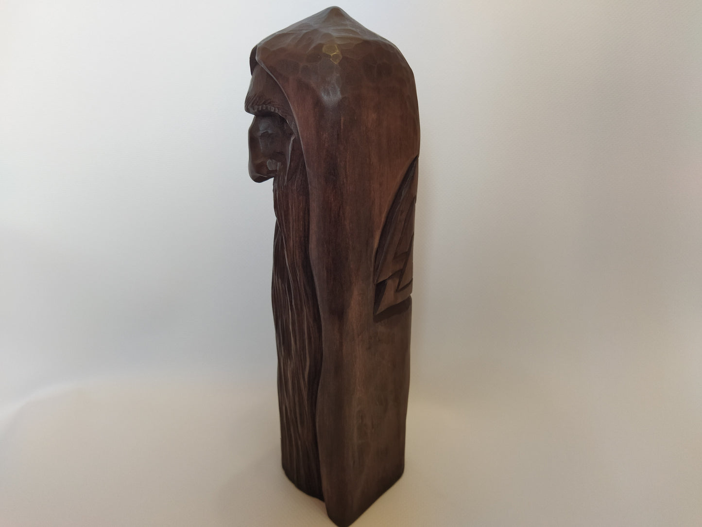 Odin statue. Handmade wooden statue of the god Odin