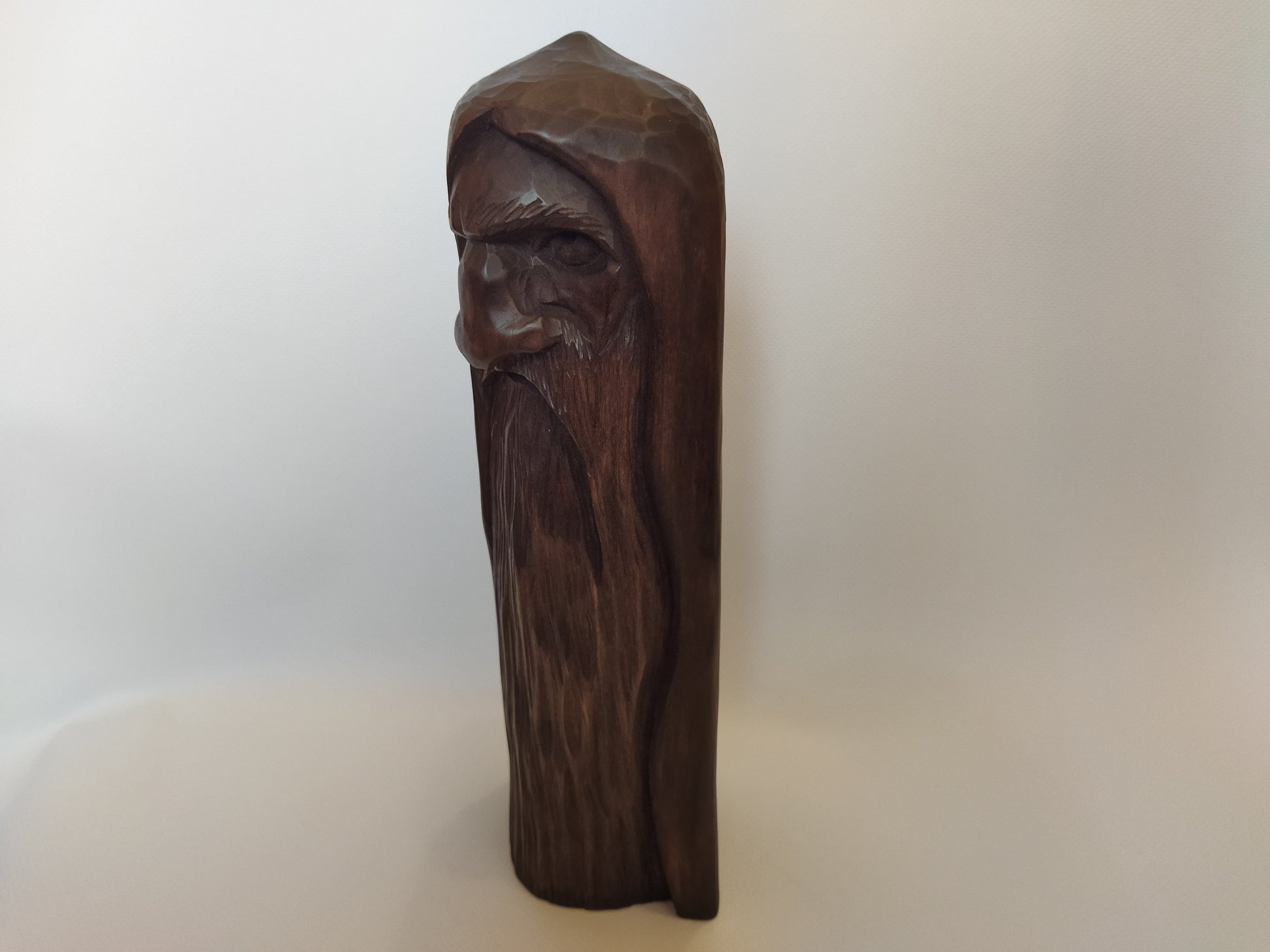 Odin statue. Handmade wooden statue of the god Odin