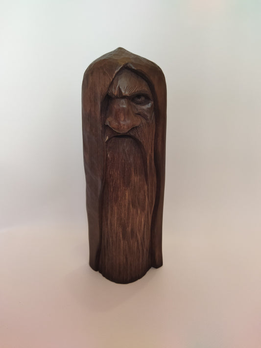 Odin statue. Handmade wooden statue of the god Odin