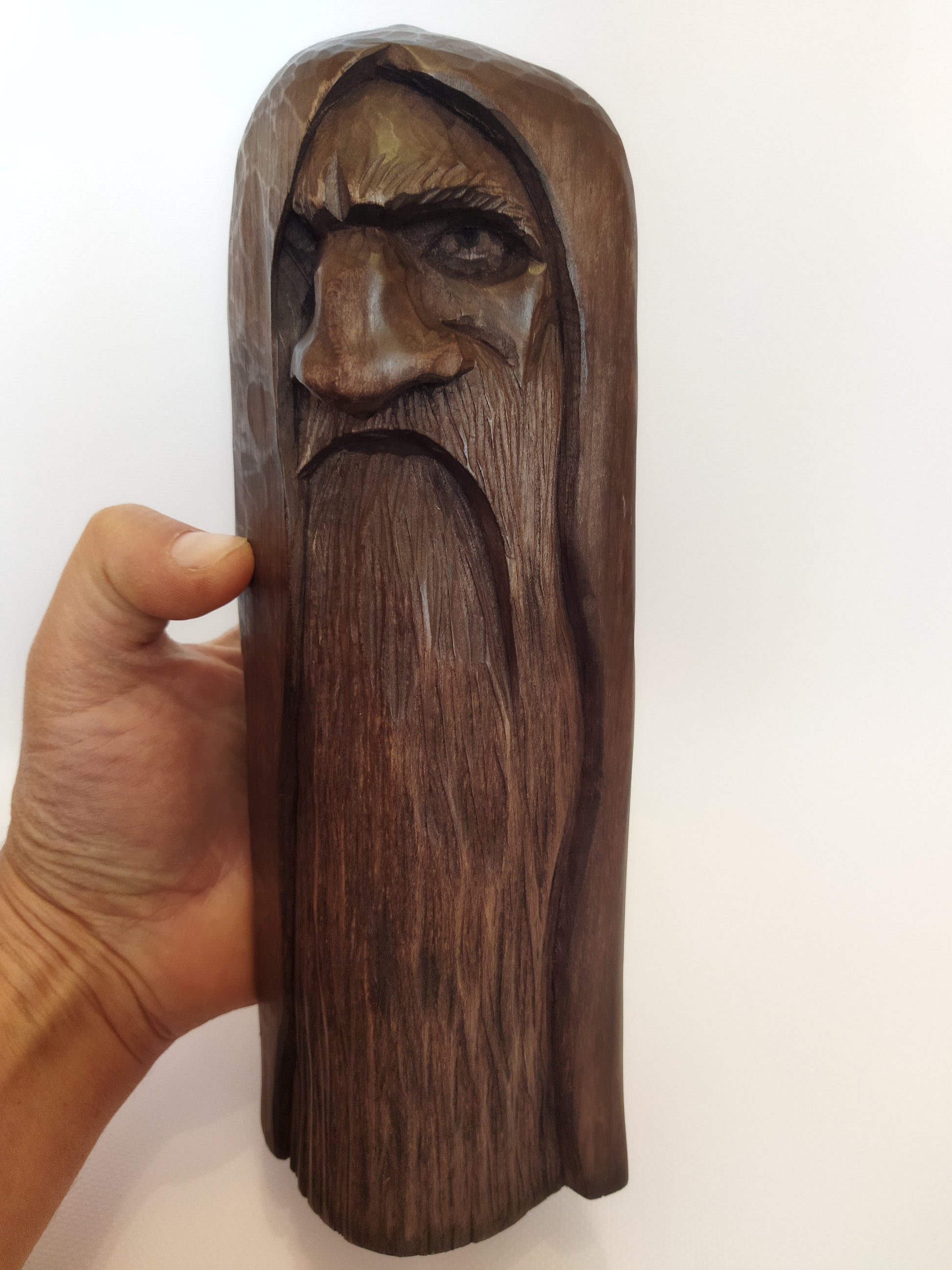 Odin statue. Handmade wooden statue of the god Odin