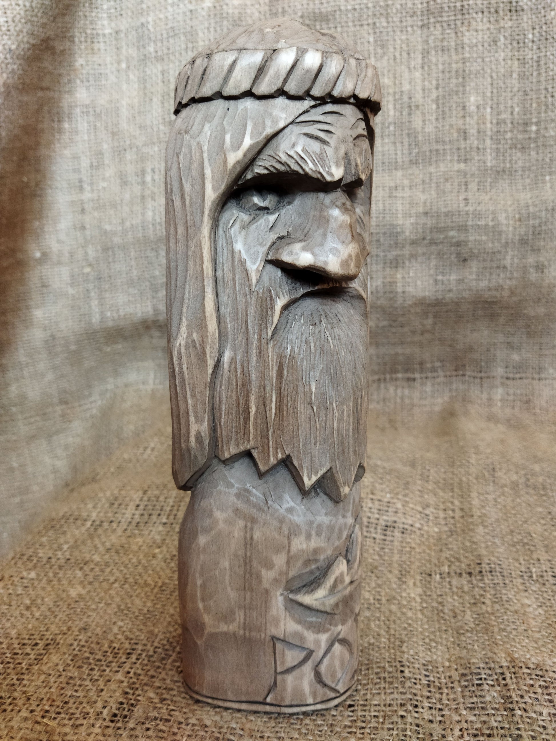 Hand-carved wooden statue of Rod, Slavic god of creation. Made from natural wood, it embodies tradition and spirituality. Perfect for altars, decor, or a unique gift