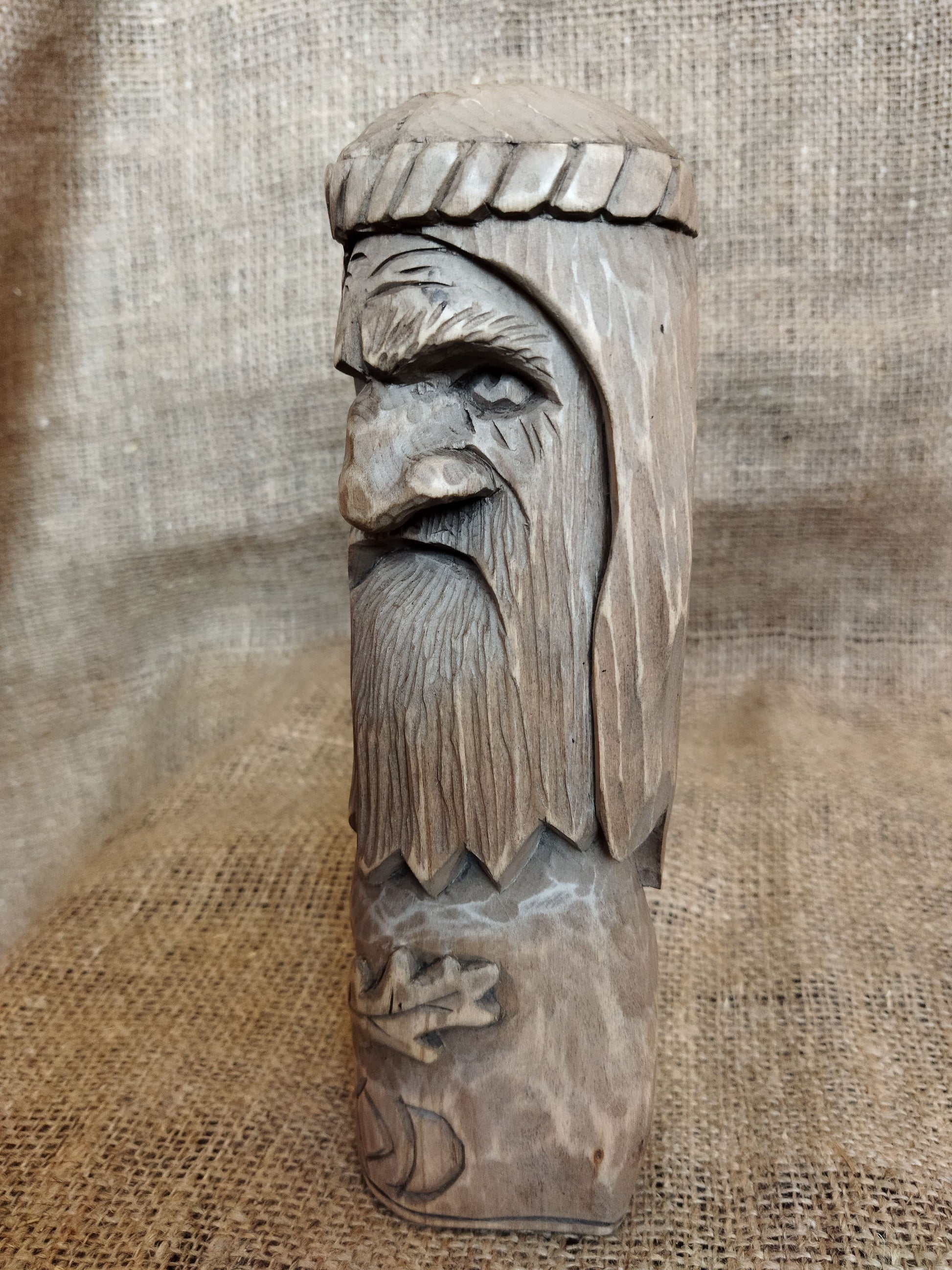 Hand-carved wooden statue of Rod, Slavic god of creation. Made from natural wood, it embodies tradition and spirituality. Perfect for altars, decor, or a unique gift