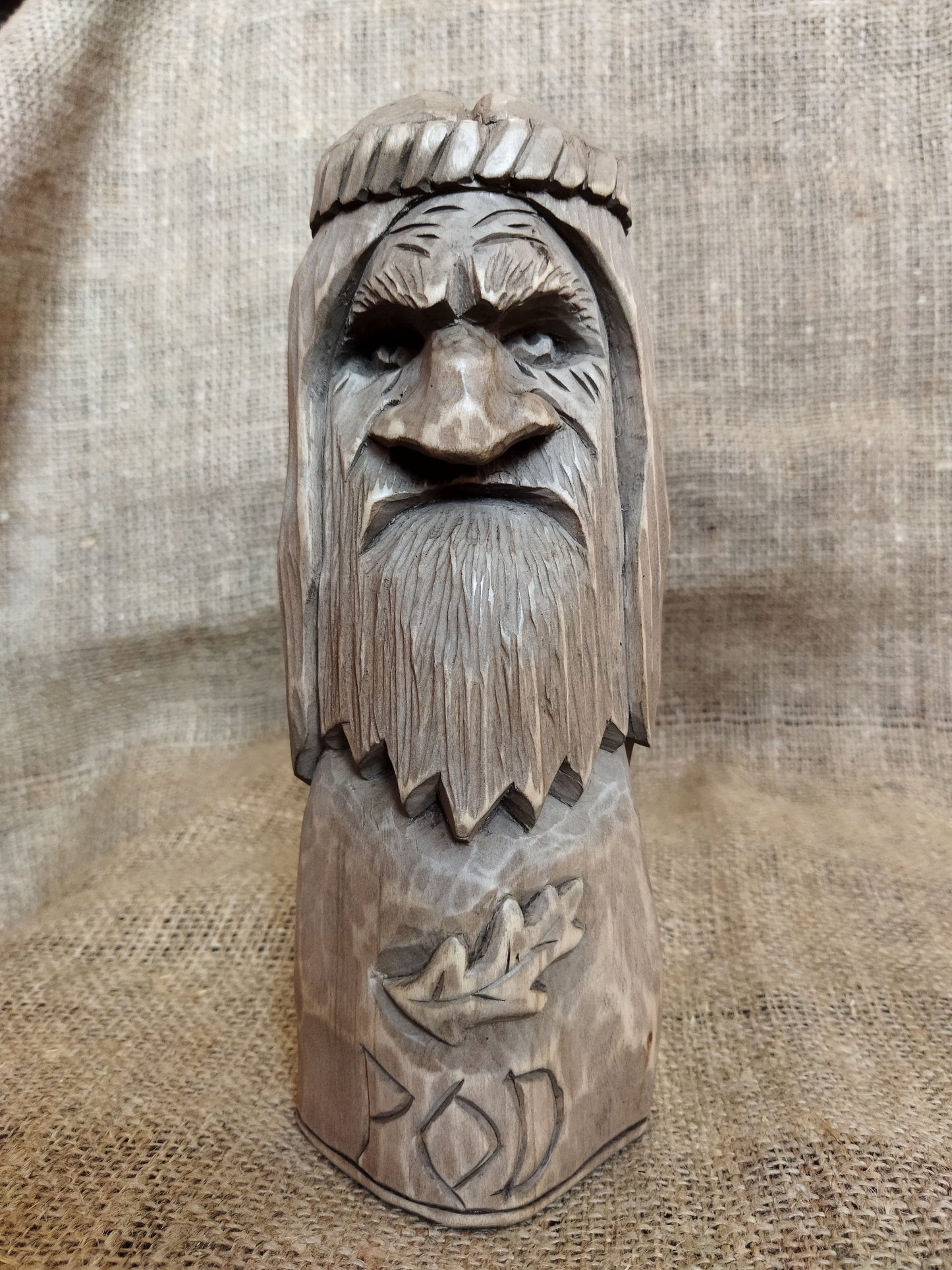 Hand-carved wooden statue of Rod, Slavic god of creation. Made from natural wood, it embodies tradition and spirituality. Perfect for altars, decor, or a unique gift